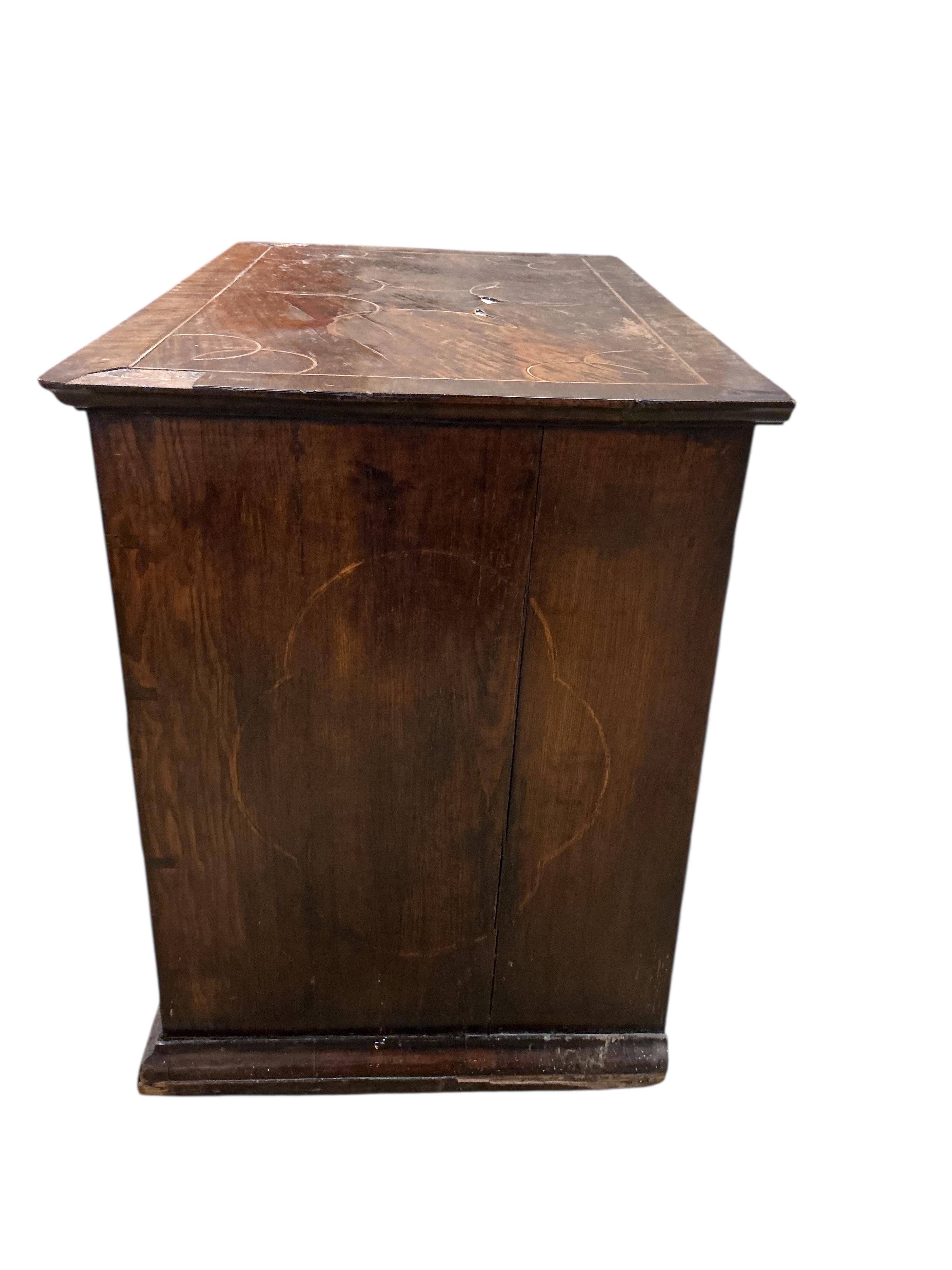 An early 18th century inlaid walnut chest, width 95cm, depth 59cm, height 77cm